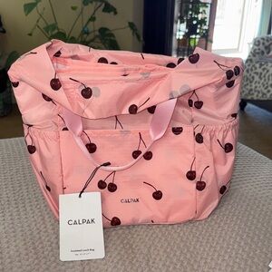 Calpak pink cherry lunch bag